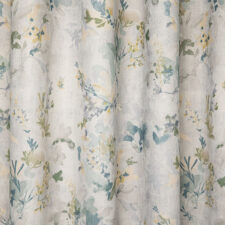 Βαμβακερό ύφασμα με μικρά floral μοτίβα σε γήινες αποχρώσεις.